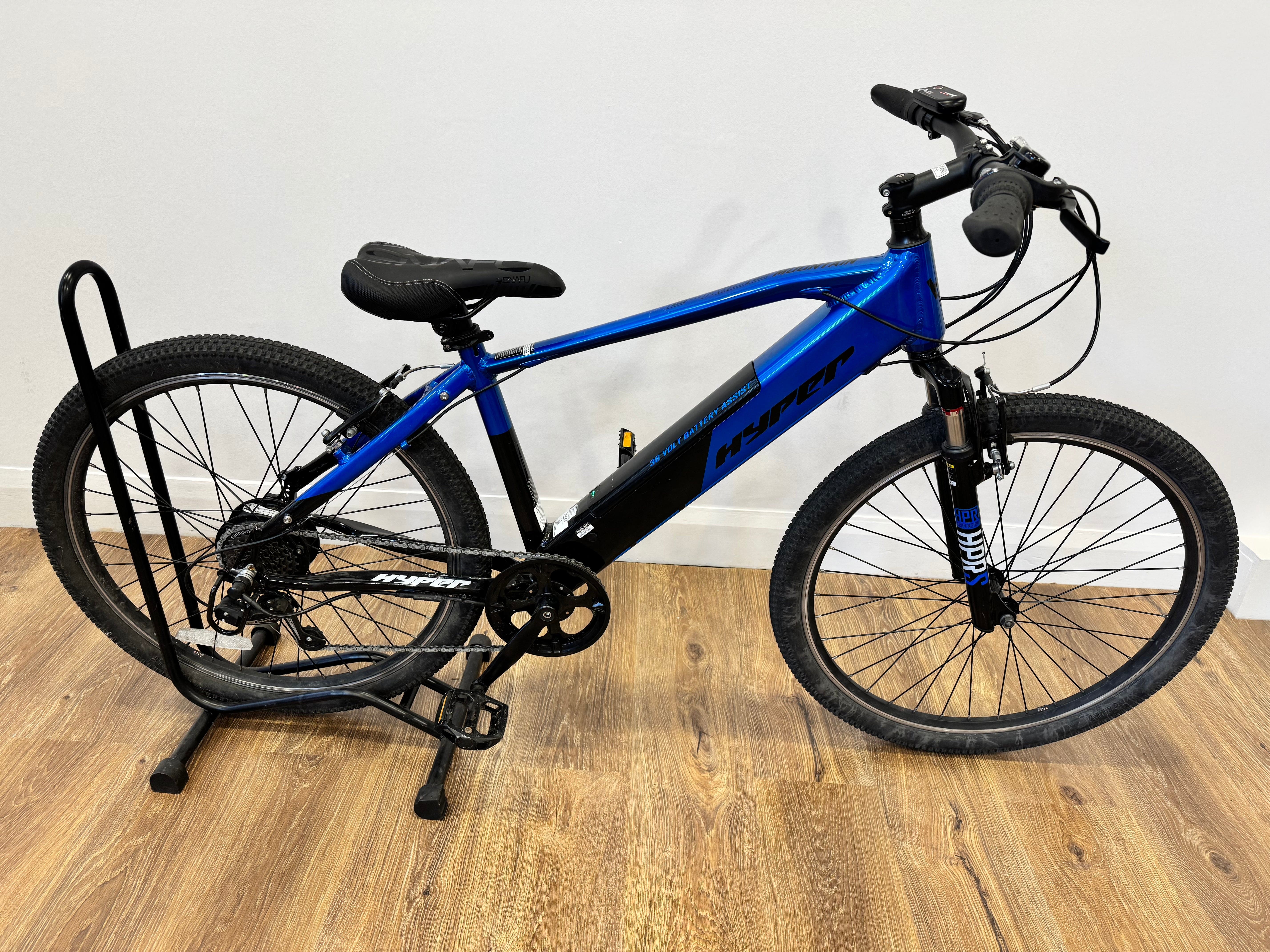 hyper bicycles electric bicycle E-Ride Bike, 36 Volt Battery, 700C Wheels, Blue BicycleYAAD brakes for enhanced stopping power and front suspension forks for a comfortable ride hyper bike - Best Buy